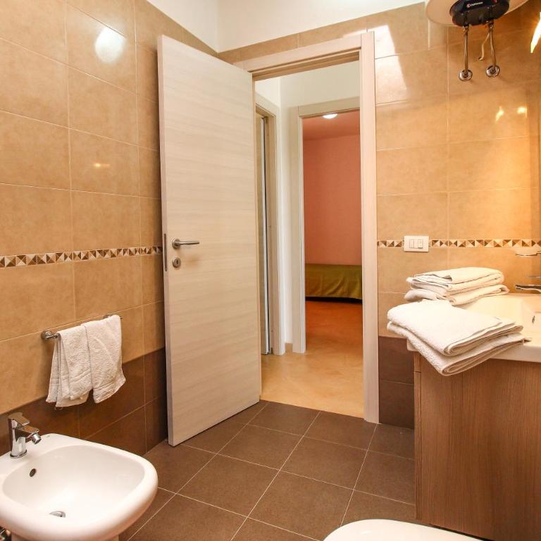 Family Suite Porto Vecchio - Casa a Schiera con 3 Camere da Letto - 4