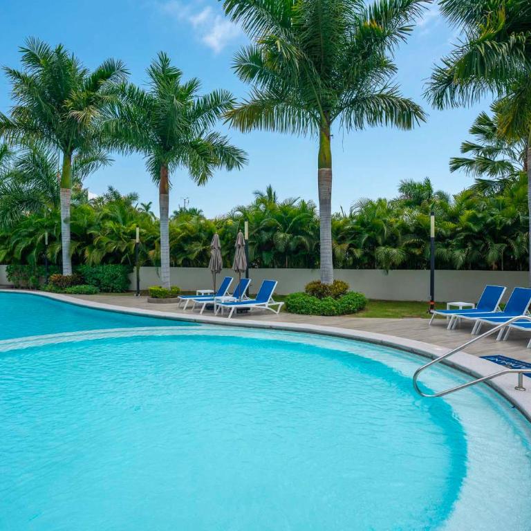 Quadrant Condos 1202 | Private Balconies | Garden & Pool Views | 8-min Walk to Beach | Full Kitchen - Apartamento Deluxe de 2 dormitorios - 10