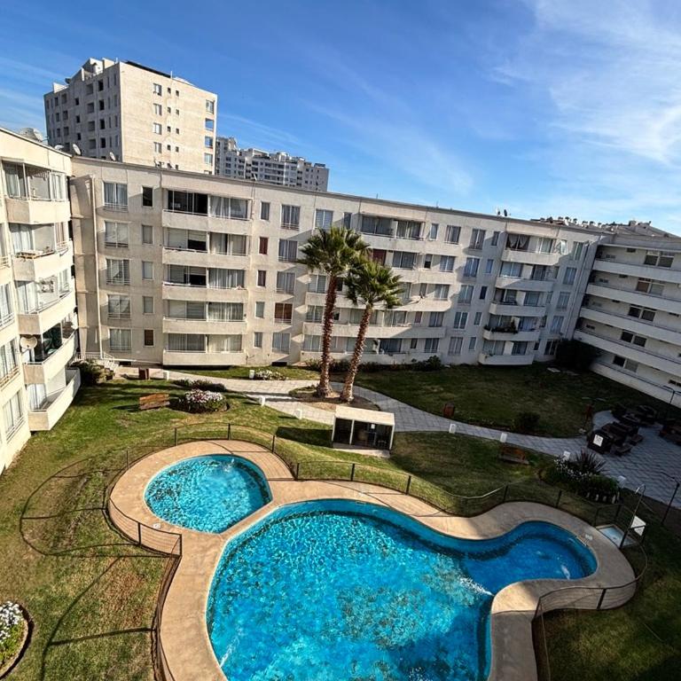 Departamento a pasos de la playa Paseo Peñuelas FULL - Three-Bedroom Apartment - 2