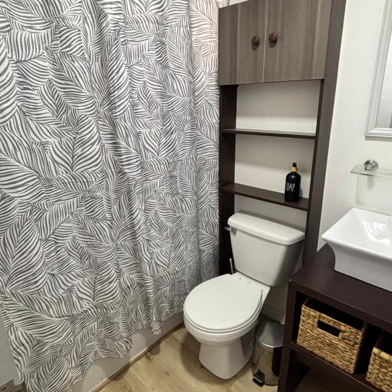 Departamento a pasos de la playa Paseo Peñuelas FULL - Three-Bedroom Apartment - 10