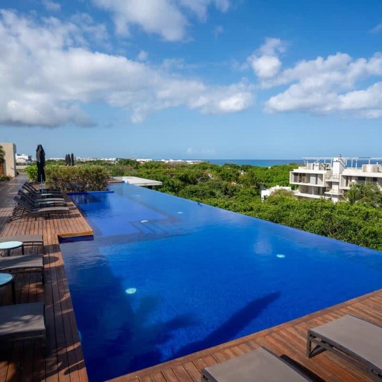 3BR Luxury Condo w/ Private Rooftop Pool & Gym - Apartment - 2