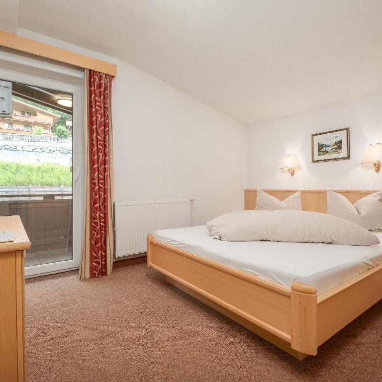 Alpenhotel Tirolerhof Gerlos - Apartment mit 2 Schlafzimmern und Bergblick - Nebengebäude - 7