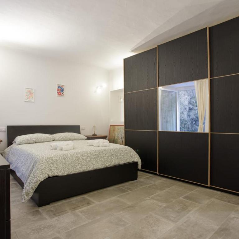 Caffaro Home - Appartamento con 2 Camere da Letto - 1