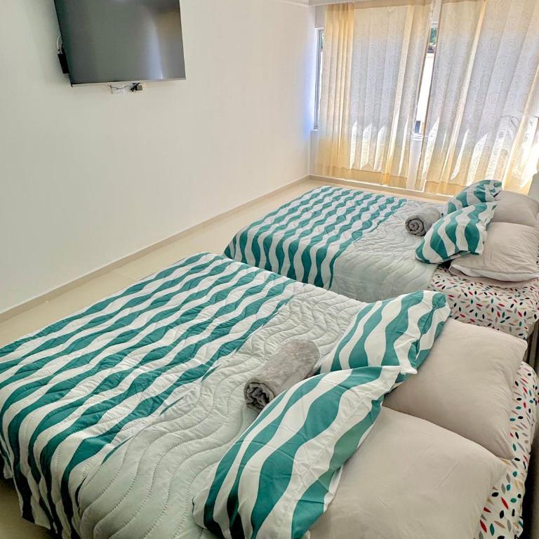 Habitaciones con Baño Privado Ideal para Descansar - Habitación Doble - 2 camas dobles - 2