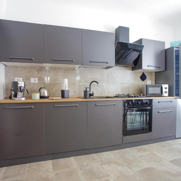 Caffaro Home - Appartamento con 2 Camere da Letto - 32