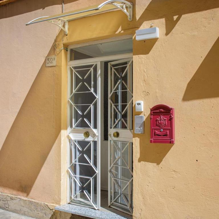 Caffaro Home - Appartamento con 2 Camere da Letto - 63