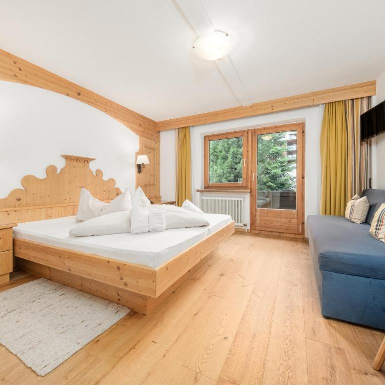 Alpenhotel Tirolerhof Gerlos - Dreibettzimmer mit Balkon - 4