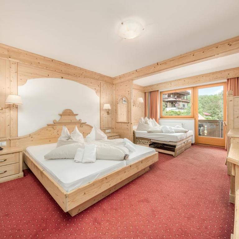 Alpenhotel Tirolerhof Gerlos - Familienzimmer mit Balkon - 5