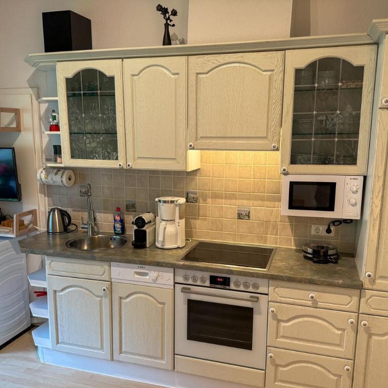 Haus Breitenberg im Allgäu - inklusive Bergbahnen und Skipass - Deluxe Apartment mit 2 Schlafzimmern und Gartenblick - 16
