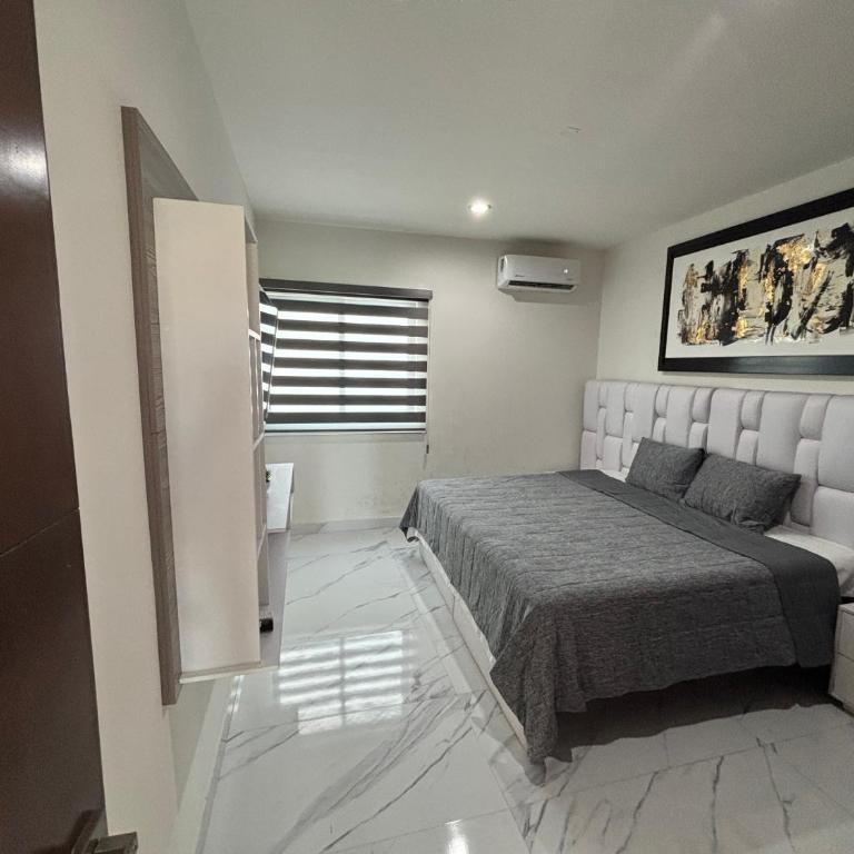 Casa palmera y sol - Three-Bedroom House - 23