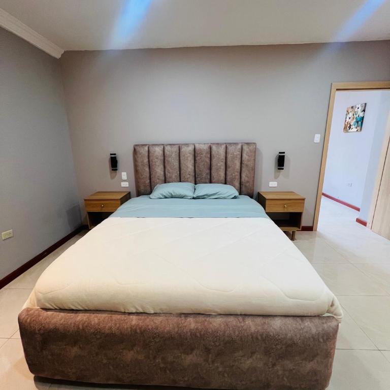 Suit Central, cómoda y minimalista perfecta para tu estadía - One-Bedroom Apartment - 3