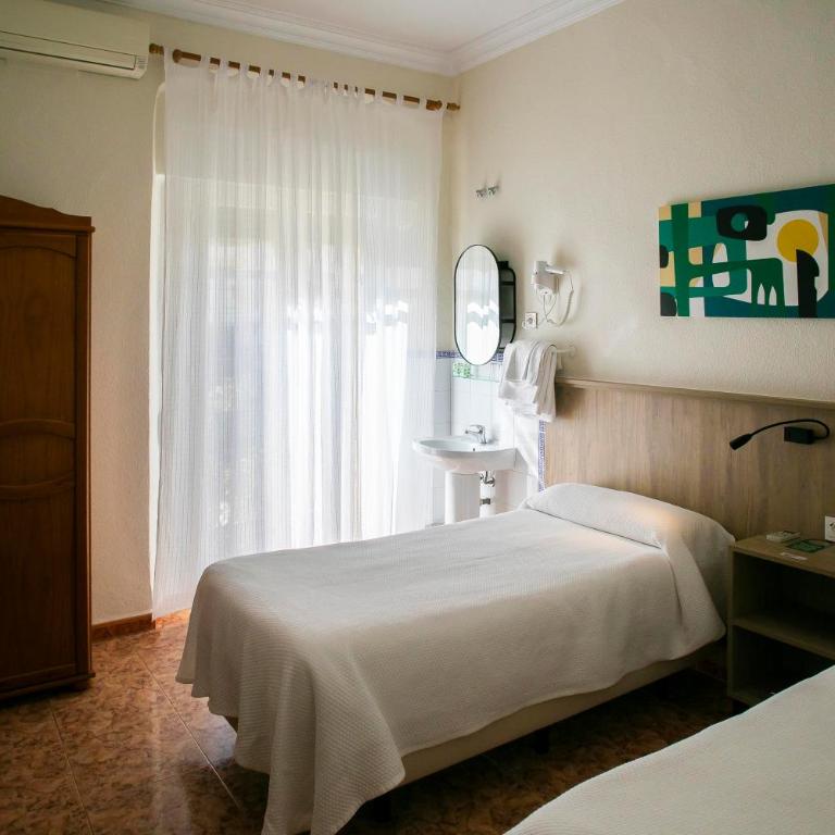 Pensión Dulces Sueños - Habitación Estándar con baño compartido - 2 camas - 9