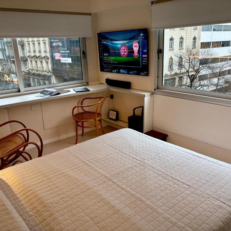 Moderno departamento sobre Av Corrientes con garage para autos - Apartamento de 1 dormitorio - 8