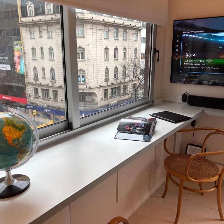 Moderno departamento sobre Av Corrientes con garage para autos - Apartamento de 1 dormitorio - 9