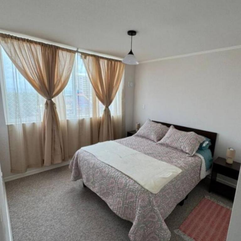 Bello departamento familiar nuevo en La Serena vista al mar, piso 4 con ascensor, malla de seguridad anticaída, piscina, estacionamiento gratuito, regalo de bienvenida, a pasos del Faro - Two-Bedroom Apartment - 15