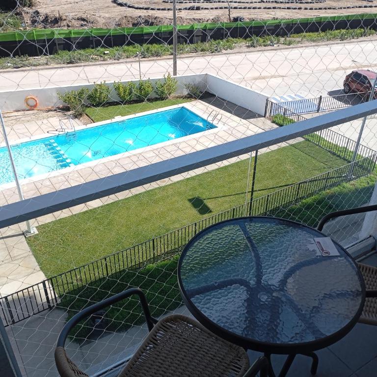 Bello departamento familiar nuevo en La Serena vista al mar, piso 4 con ascensor, malla de seguridad anticaída, piscina, estacionamiento gratuito, regalo de bienvenida, a pasos del Faro - Two-Bedroom Apartment - 14