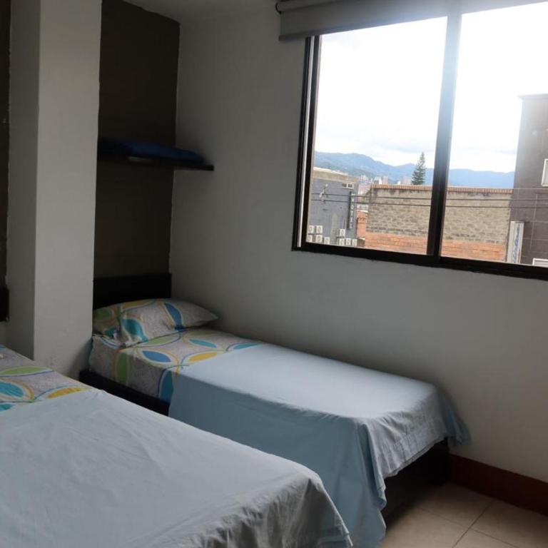 HOTEL EL PUNTOS sas - Habitación Doble con baño privado - 2 camas - 4