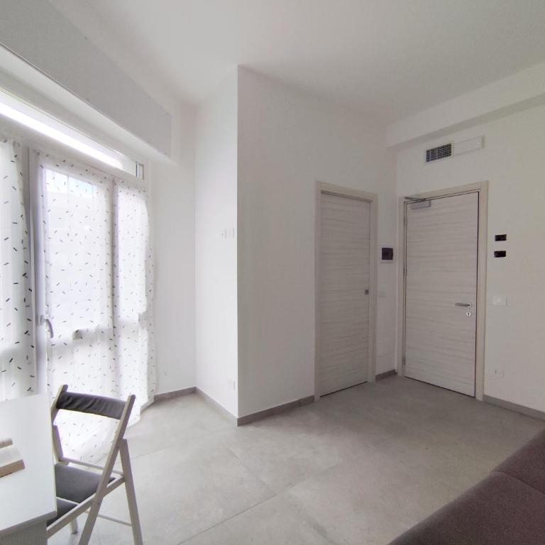 Residence Mario Bianco - Appartamento con Vista Giardino - 9