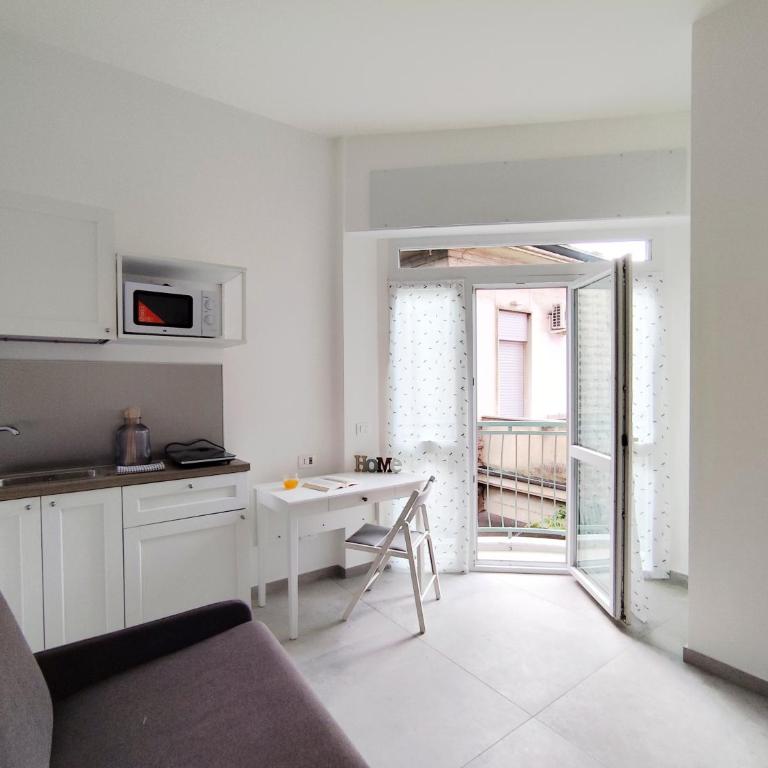 Residence Mario Bianco - Appartamento con Vista Giardino - 32