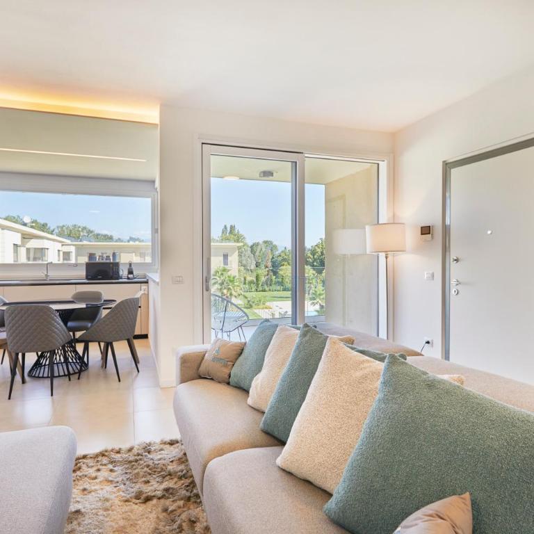 Queen Loft - Attico Moderno con Solarium Privato e Vista Piscina - Appartamento Attico - 13