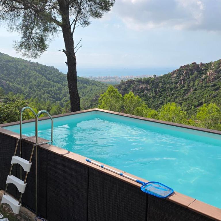 casa y piscina en un parque natural - Three-Bedroom House - 8