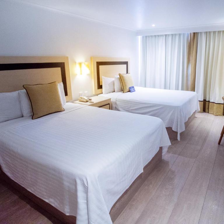Hotel Stella Maris - Habitación Doble Deluxe - 2 camas dobles - 7