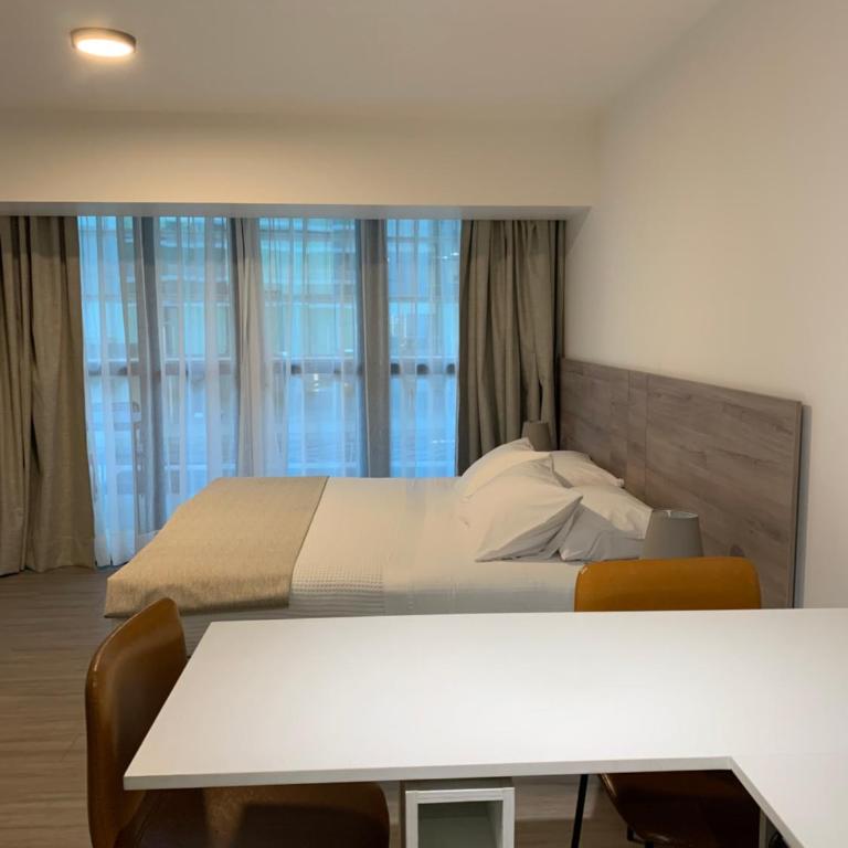 Urban Suites Apart Hotel con Estacionamiento Gratuito - Studio Apartment with King Bed - 14
