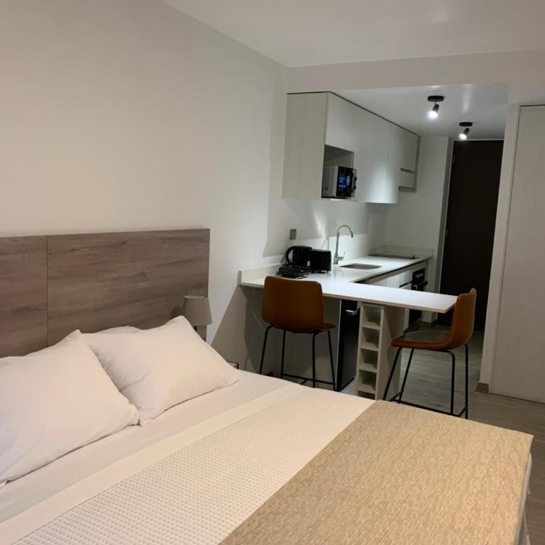 Urban Suites Apart Hotel con Estacionamiento Gratuito - Studio Apartment with King Bed - 16