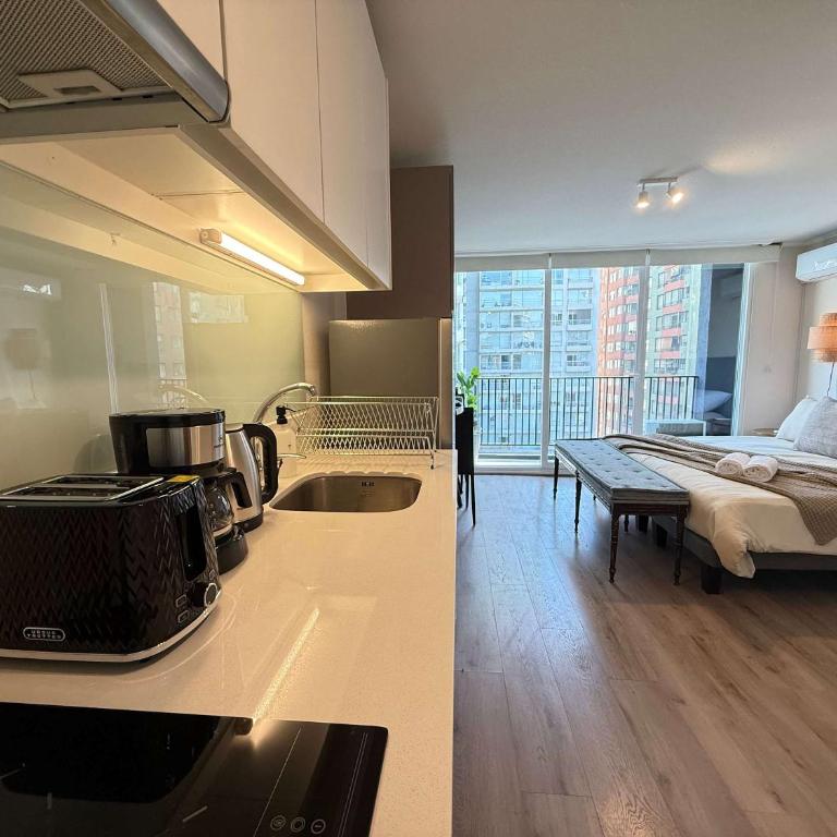 HOM I WiFi AA 4 minutos del Metro Santa Lucia - Apartment - 11