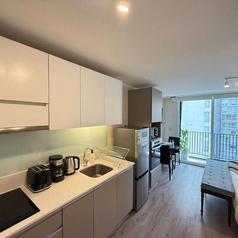 HOM I WiFi AA 4 minutos del Metro Santa Lucia - Apartment - 12
