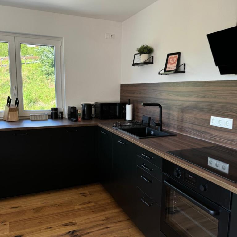 Neubau, Bergpanorama, gute Lage, Tiefgarage - Apartment mit 2 Schlafzimmern - 4
