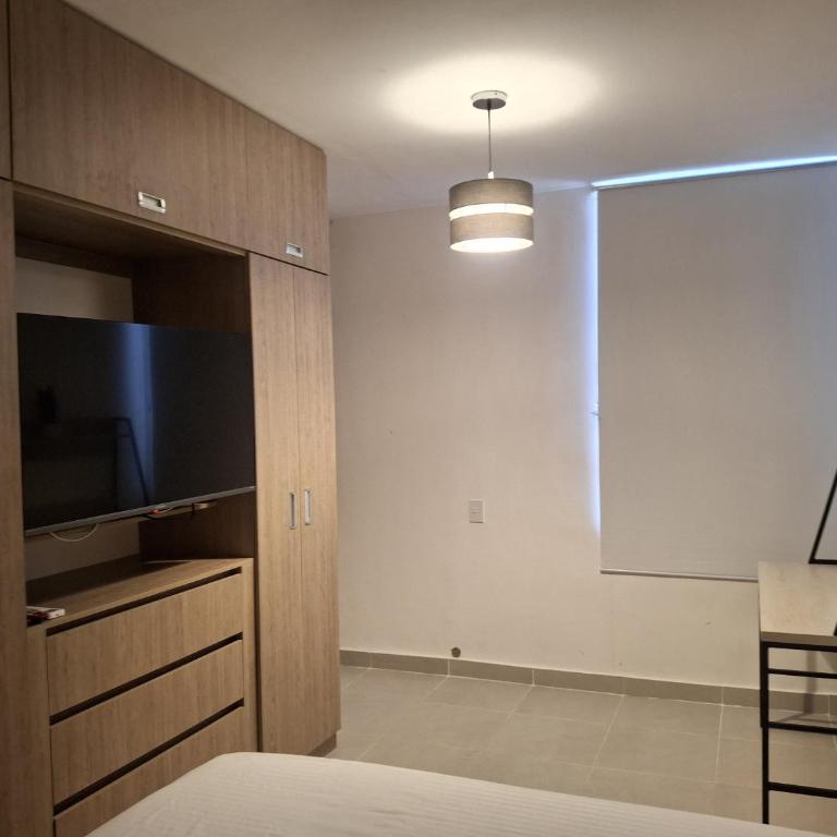 Apto amoblado con aire, piscina y parqueadero en Valledupar - Two-Bedroom Apartment - 21