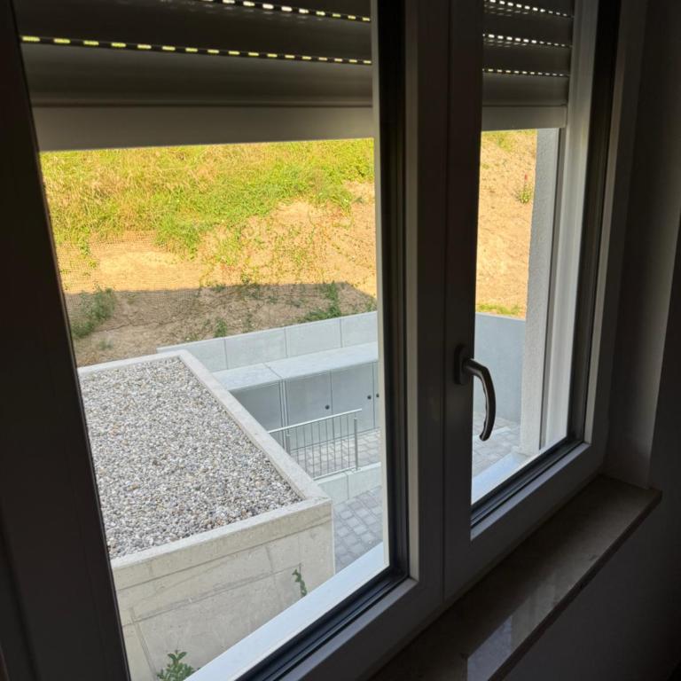 Neubau, Bergpanorama, gute Lage, Tiefgarage - Apartment mit 2 Schlafzimmern - 32