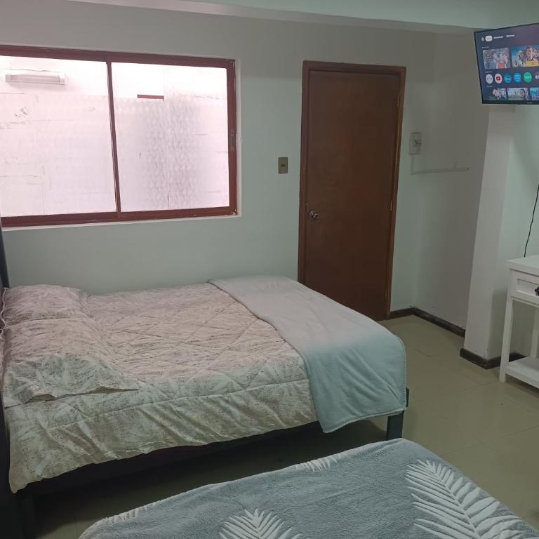Hostal O'Higgins - Quadruple Room with Private Bathroom - 12