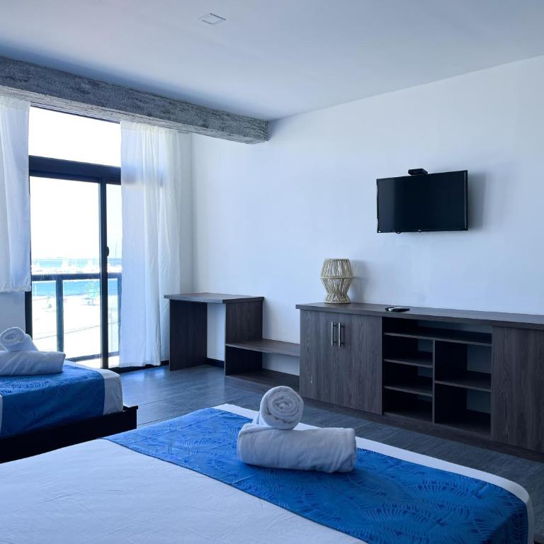 Hotel Salibreeze - Habitación Triple Deluxe con vistas al mar - 4