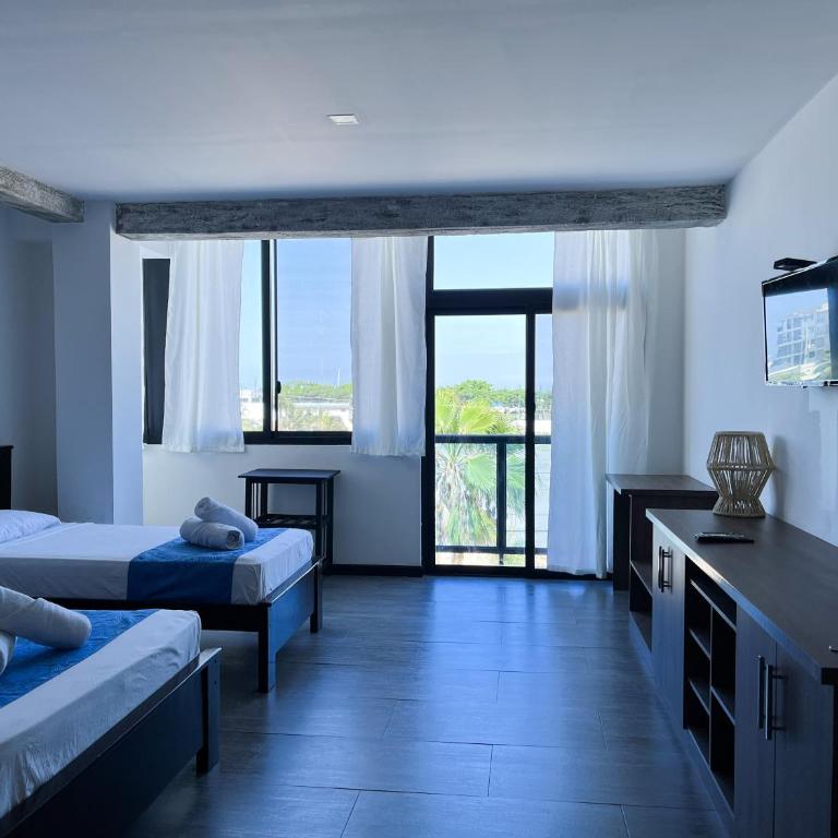 Hotel Salibreeze - Habitación Triple Deluxe con vistas al mar - 1