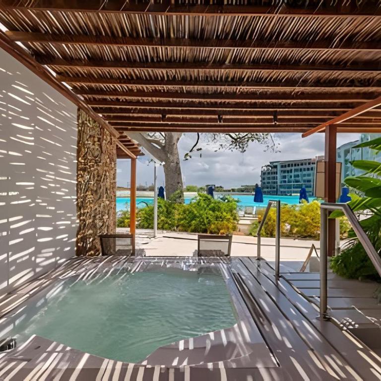 Vista a Laguna cristalina + 2 alc + parking - Two-Bedroom Apartment with Pool View - 48