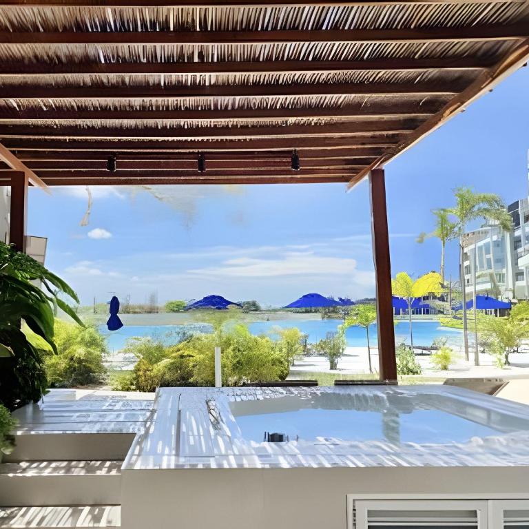 Vista a Laguna cristalina + 2 alc + parking - Two-Bedroom Apartment with Pool View - 55
