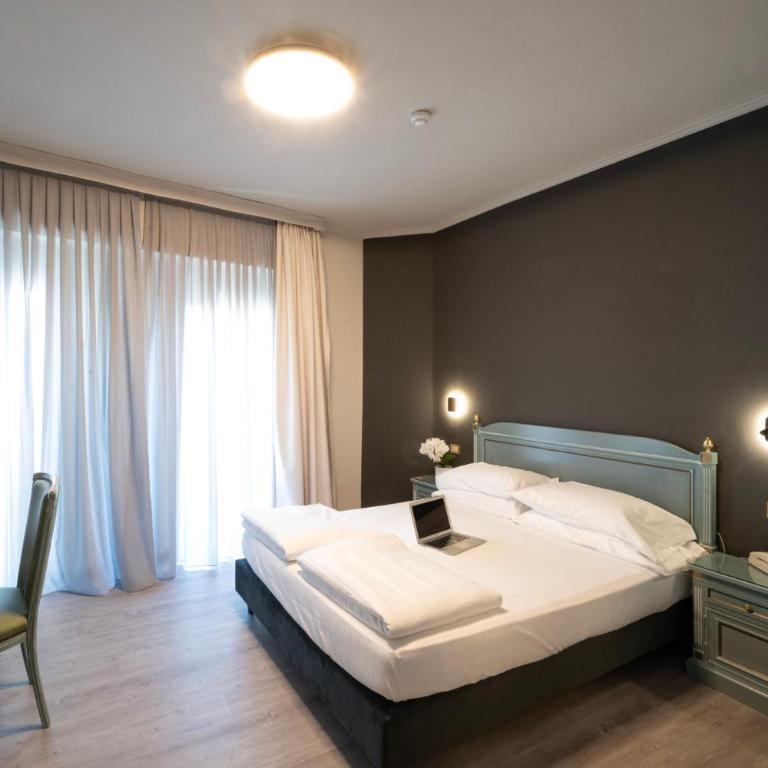Cavour 30TRE - Moderno per tradizione - Camera Quadrupla Premium - 2