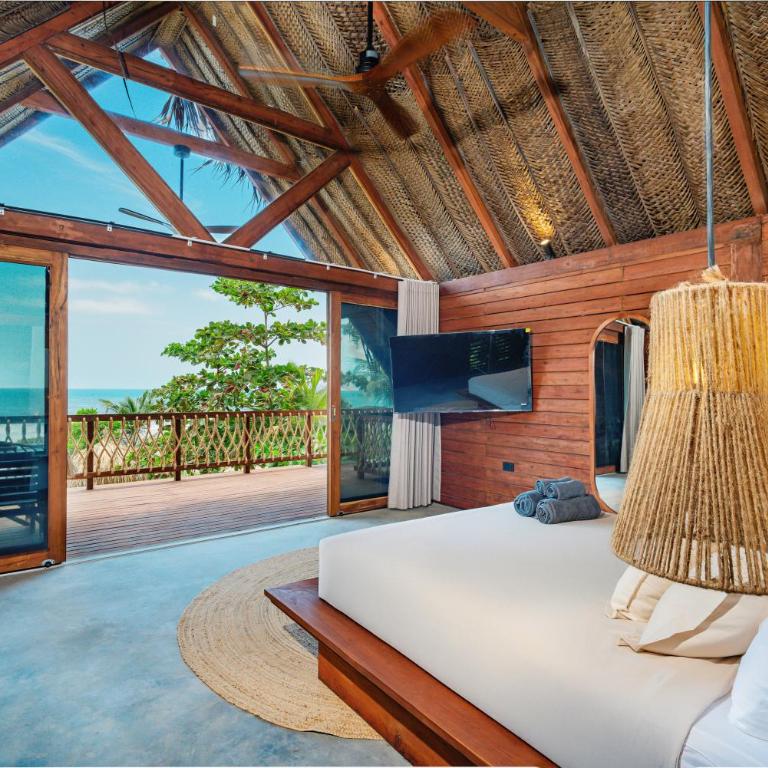Casa Iwana Tayrona Suites Deluxe Playa y AC - Suite con vistas al mar - 6