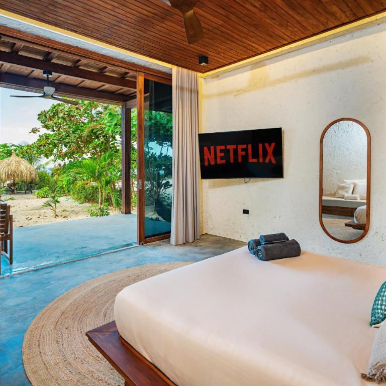 Casa Iwana Tayrona Suites Deluxe Playa y AC - Suite con vistas al mar - 6
