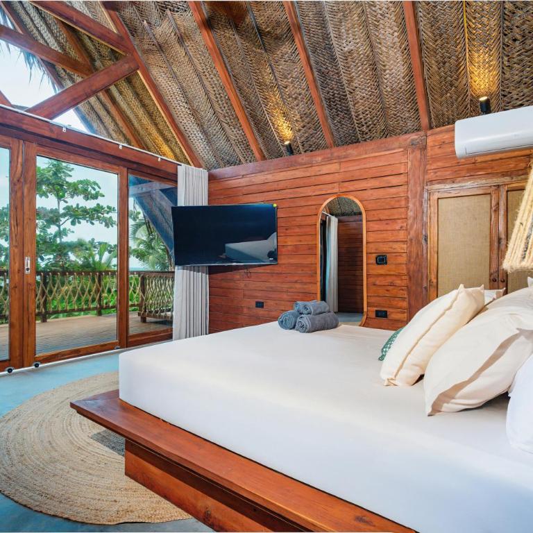 Casa Iwana Tayrona Suites Deluxe Playa y AC - Suite con vistas al mar - 7