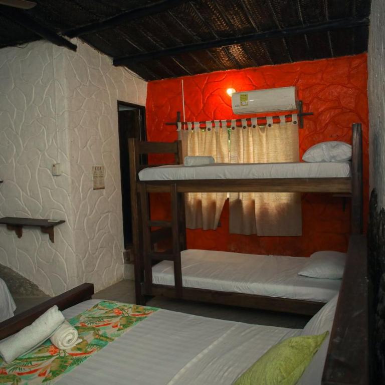 Restaurante, Hostal y Spa Mama Neyumun - Cama individual en dormitorio mixto - 2