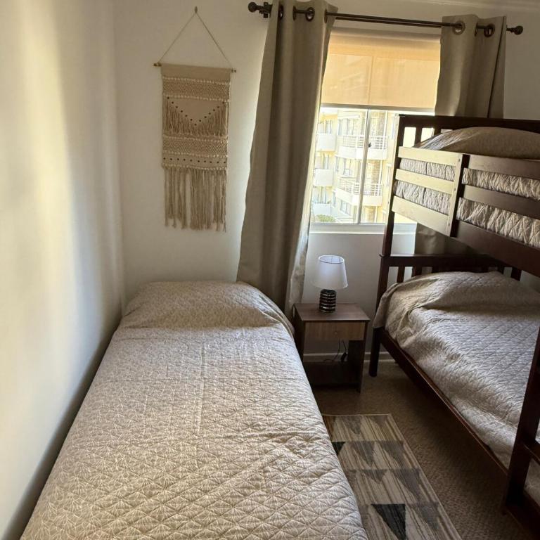 Moderno departamento en El Tabo - Two-Bedroom Apartment - 11
