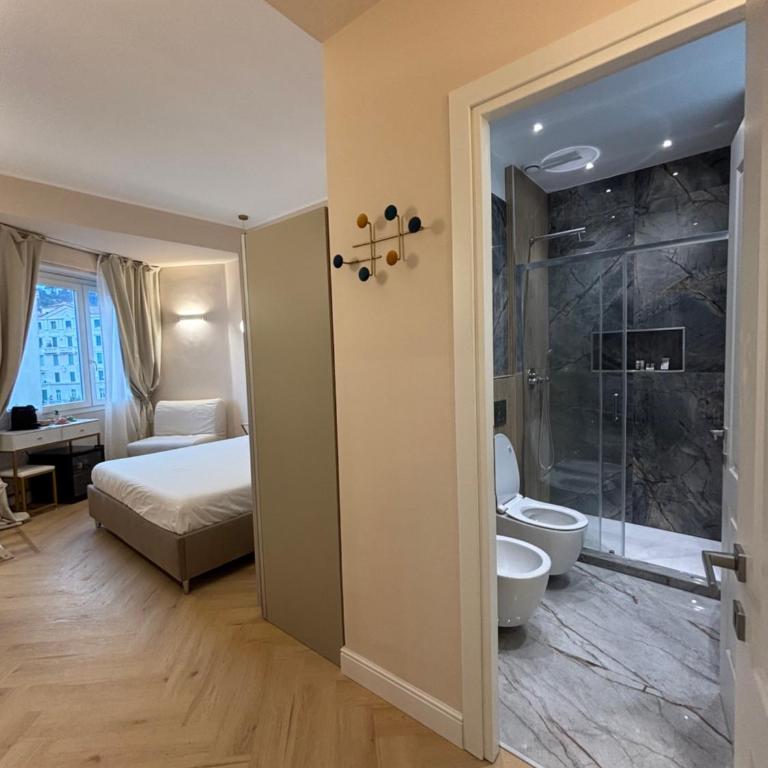 GLhouse Roma Mazzini - Camera Matrimoniale con Letto Supplementare - 3