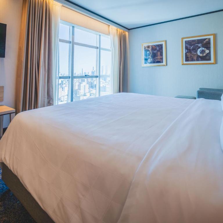 Holiday Inn Rosario by IHG - Habitación Premium con cama extragrande - 2