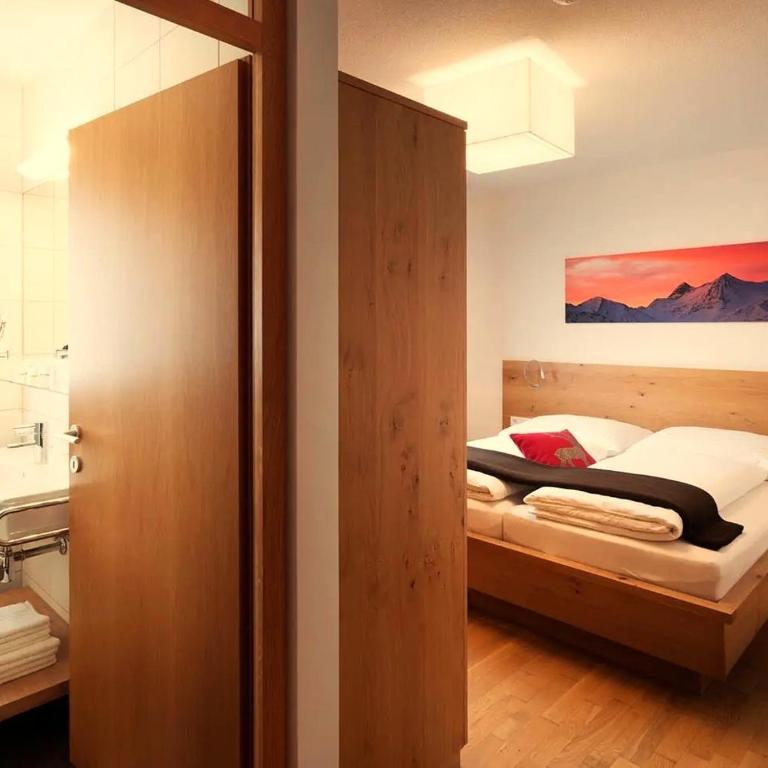 AlpinPark Chalet mit Swimmingpool, Sonnenloggia und Kamin - Großglockner Resort Matrei - Apartment mit 3 Schlafzimmern und Bergblick - 14