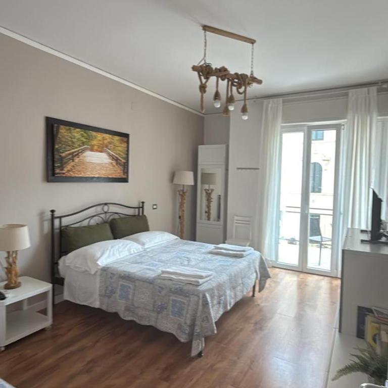 ES - Essential Solution & Emotion Stories (locazione turistica) - Camera Tripla con Bagno in Comune - 2