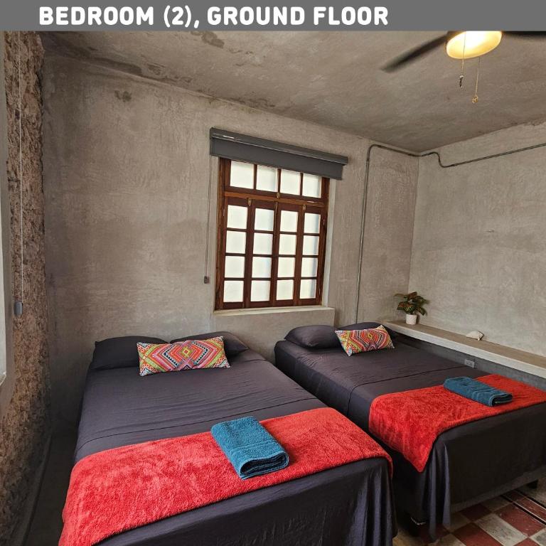 Casa para 12 persona con Piscina, Mérida Centro, Casa Nido Rosa - Habitación Cuádruple con baño privado - 12