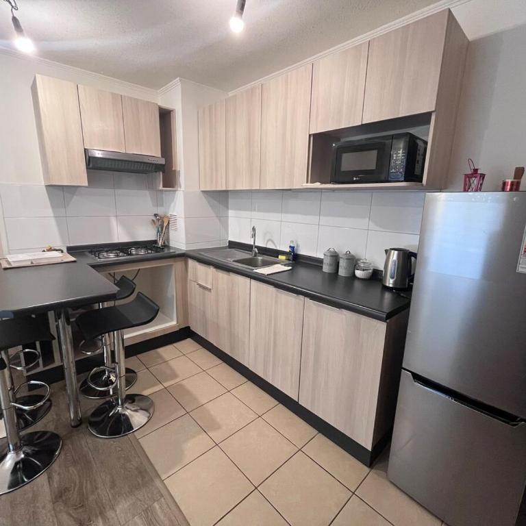 Moderno departamento con WiFi, y estacionamiento en Coronel - Apartamento de 2 dormitorios - 9